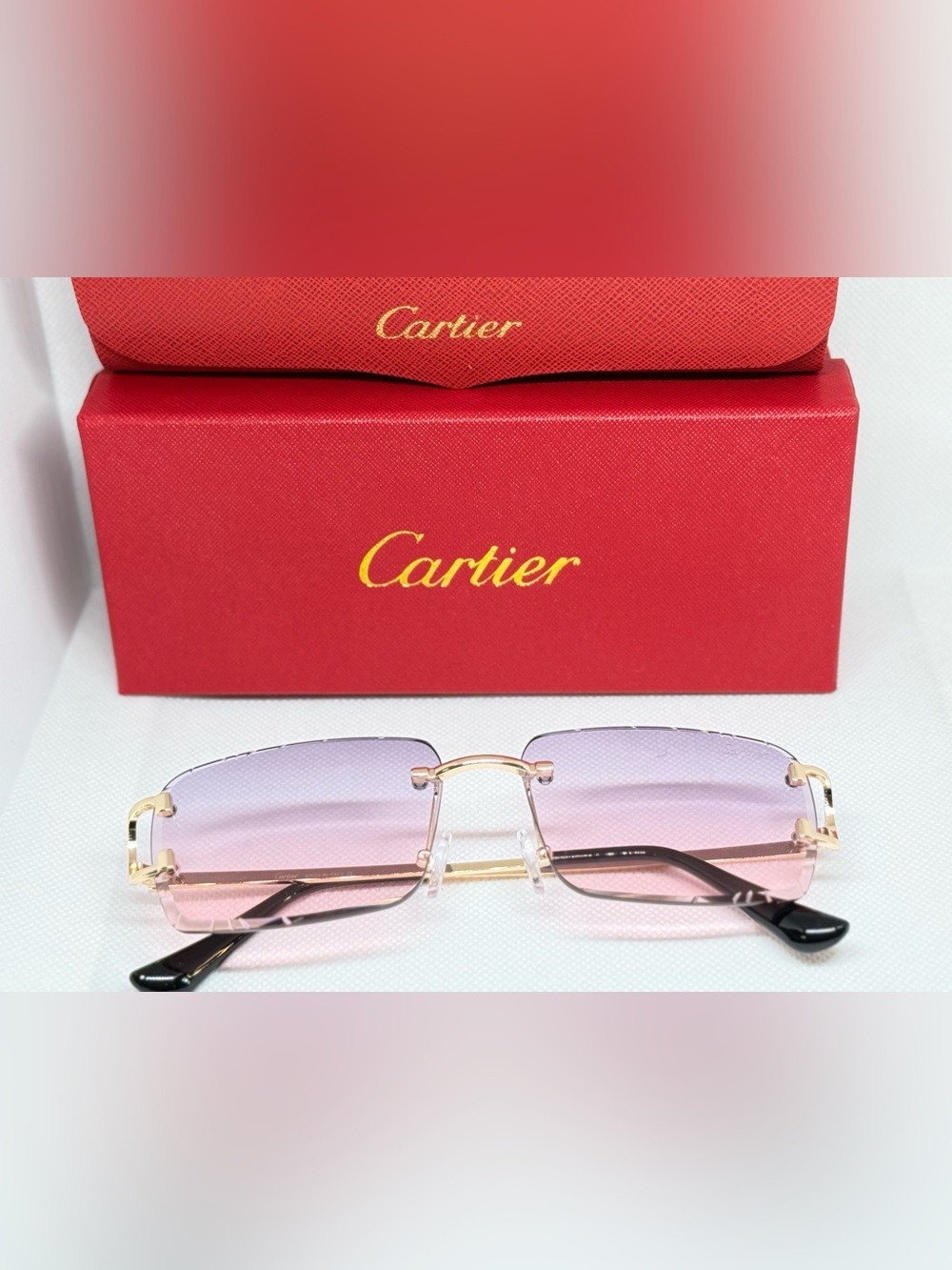 Cartier Rimless Sunglasses with Lilac-to-Pink Gradient and Gold Bridge